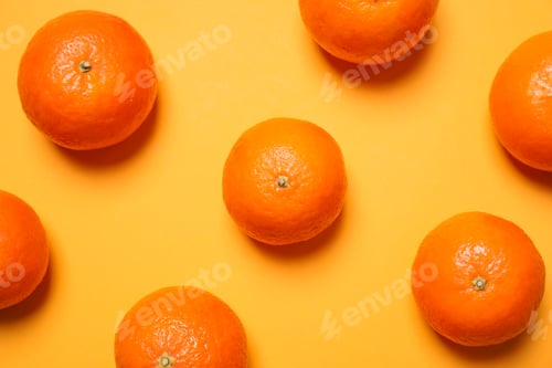 Preview: Fresh ripe tangerines on yellow background, flat lay