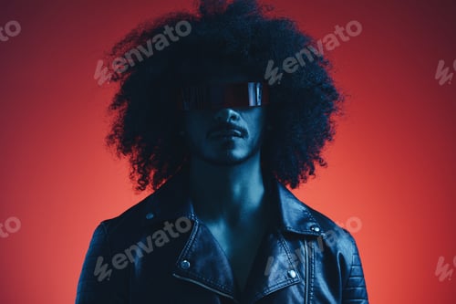 Preview: Portrait of fashion man with curly hair on red background with stylish glasses, multicultural
