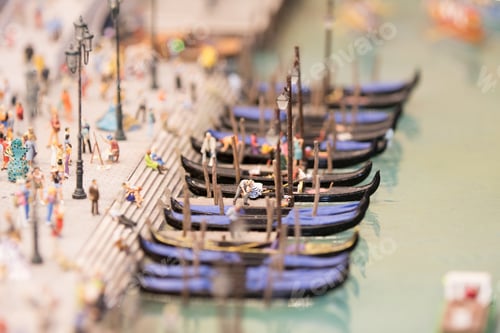 Preview: series of gondolas are moored along the canal, ready to transport tourists