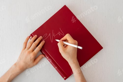 Preview: a author sign the autograph of his new novel book to the fan reader, popularity concept