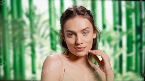 Preview: Smiling flawless woman with bare luminous skin