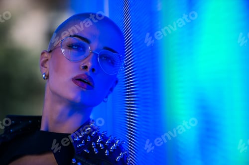 Preview: Beautiful woman illuminated by led lights