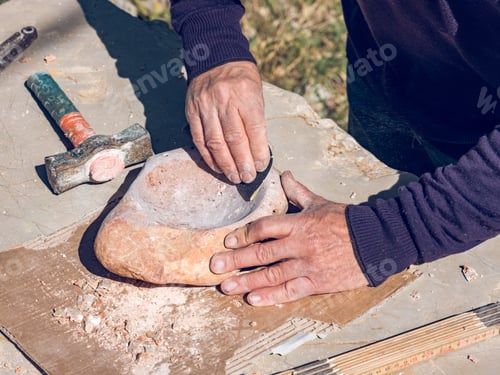 Preview: Anonymous craftsman creating stone craft