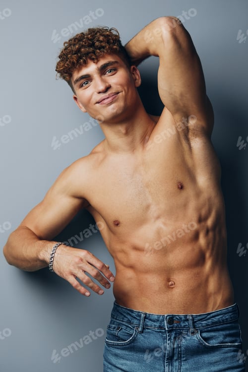 Preview: man standing sport bicep muscular handsome chest naked person strong jeans torso young