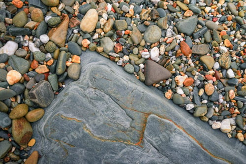 Preview: Mineral background of blue slate and colorful pebbles