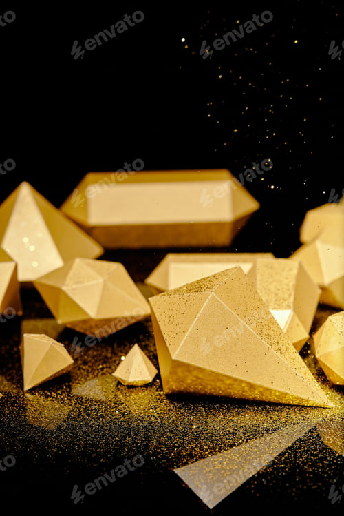 Preview: close-up view of shiny glittering pieces of gold and golden dust on black