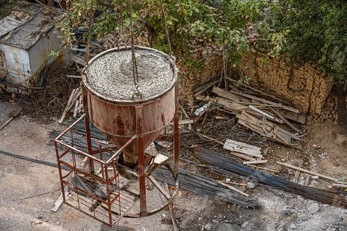 Preview: High angle shot of a dirty construction site with machinery