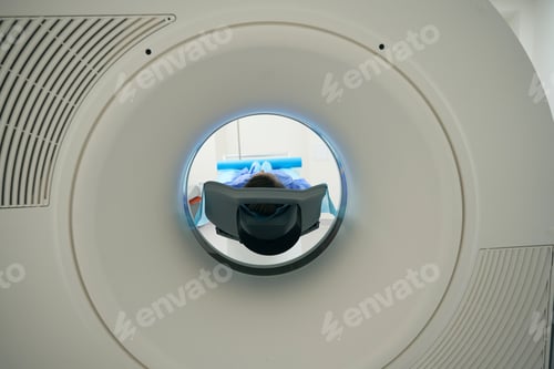 Preview: Patient is placed in the chamber of modern MRI machine