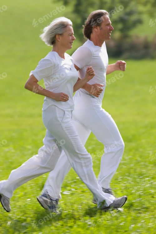 Preview: Couple running in field