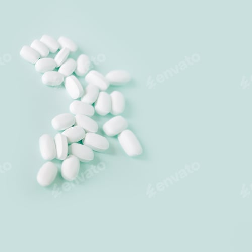 Preview: Medicine pills. Close up of white large pills with pharmacy and medical concept. Flat lay, top view.
