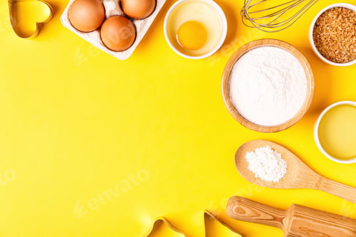 Preview: Ingredients and utensils for baking on a pastel background.