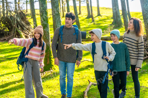 Preview: Family with three children hiking in alpine scenery