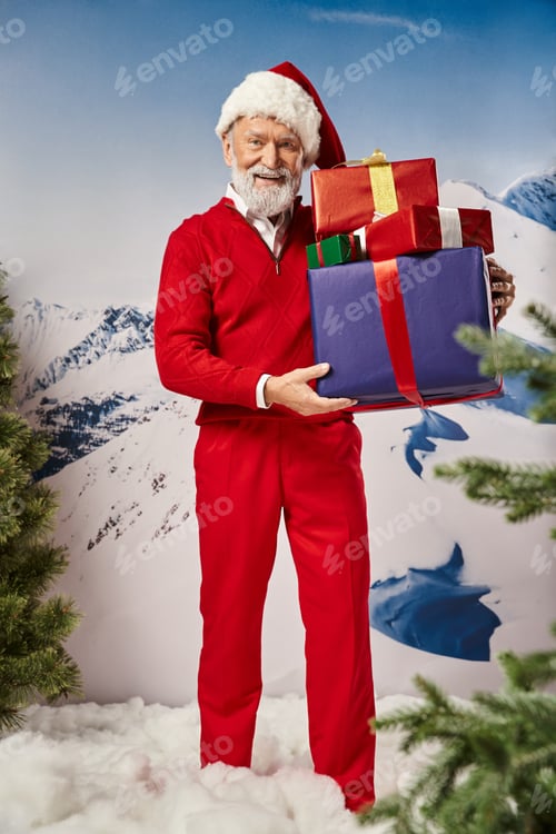Preview: cheerful man in red Santa costume with presents in hands with snowy backdrop, winter concept