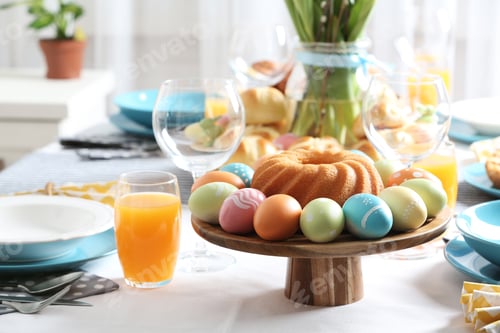 Preview: Festive Easter table setting with traditional meal, space for text