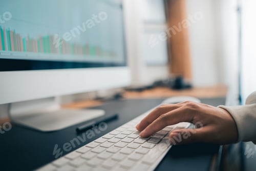Preview: Man working on computer desk at home office