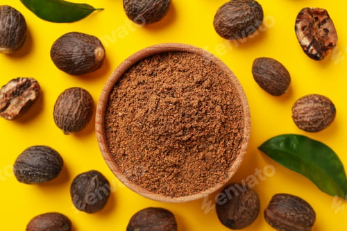 Preview: Concept of spices and condiments, nutmegs, top view