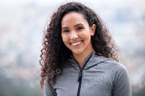 Preview: Closeup shot of a fit young woman out for a workout