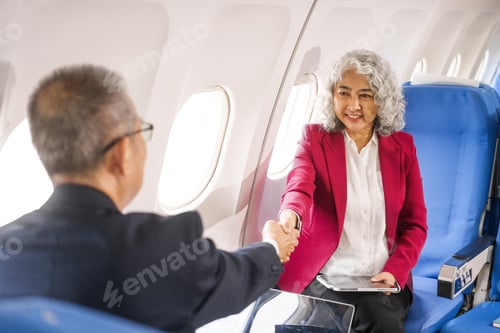 Preview: A businessman, an adult man, and a woman are meeting talking aboard an airplane. They hold hands,