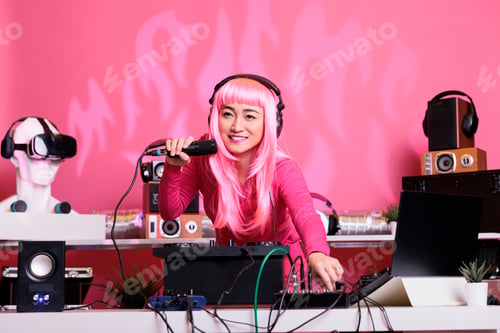Preview: Artist with pink hair mixing techno song with electronic using professional turntables