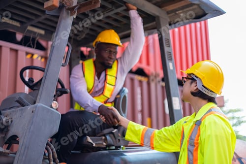 Preview: Engineer loads goods by forklift to stack containers