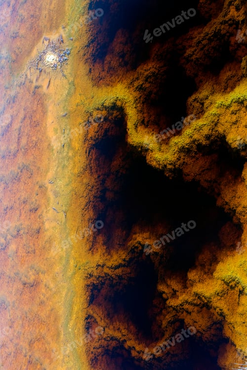 Preview: Multicolored mineral stratum on river