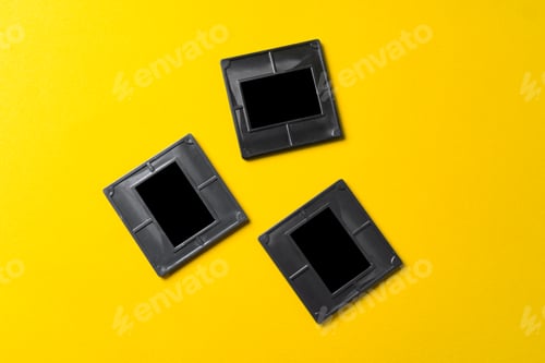 Preview: Photography empty slide frames on yellow background