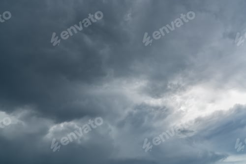 Preview: Dark dramatic sky and clouds. Background for death and sad concept. Gray sky and fluffy white clouds