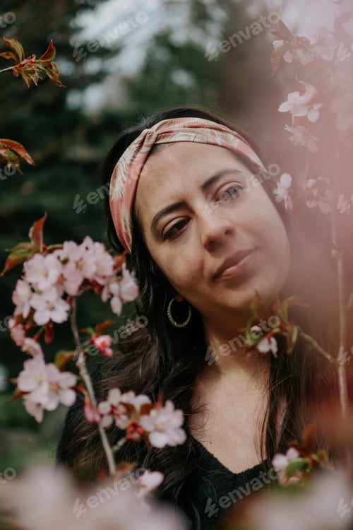 Preview: Young beautiful girl outdoors enjoying sunny spring days