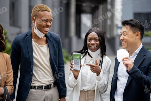 Preview: People with masks and app of Covid-19 Vaccination