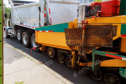 Preview: Close view on the road working on the new road construction site