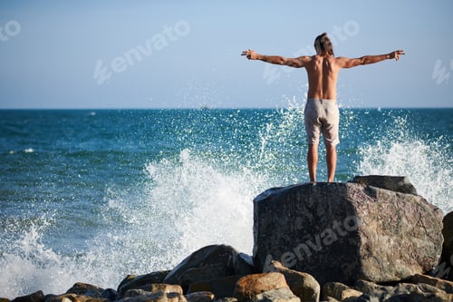 Preview: Man Looking at Breaking Waves