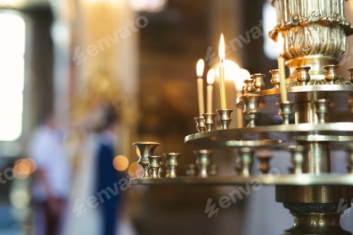 Preview: Close-up of candles in the church before the wedding ceremony