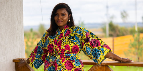 Preview: Banner african american woman enjoying evening on village and nature on terrace of country house