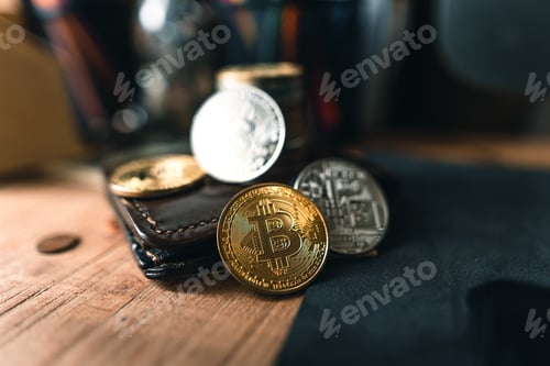 Preview: Bitcoin coins on a wooden desk at home