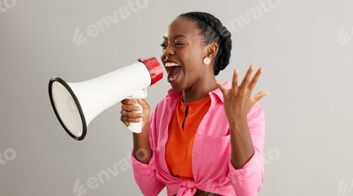 Preview: Megaphone, shout and excited black woman on gray background for news, announcement and information.