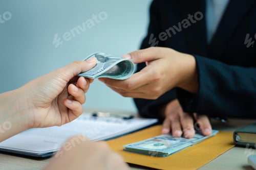 Preview: A female accountant or a business woman is giving a male businessman a bribe. And he agreed to recei