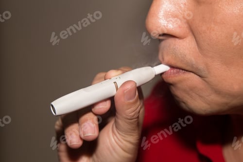 Preview: Smoker smoking hybrid smokeless cigarette device that uses real