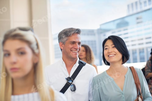 Preview: Group of casual businesspeople on urban square