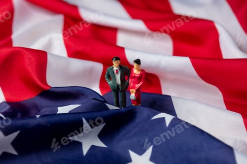 Vista previa: miniature figure of a female and male politicians on USA flag