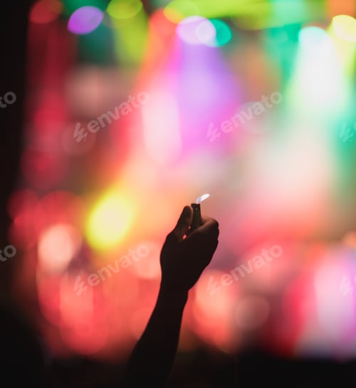 Preview: Crop hand with lighter on concert