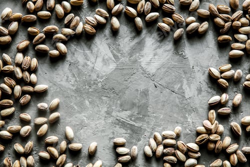 Preview: Big set of salted pistachios on the table. Pistachios nuts