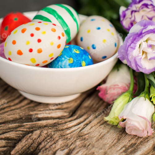 Preview: Colorful easter eggs and lisianthus on wooden table