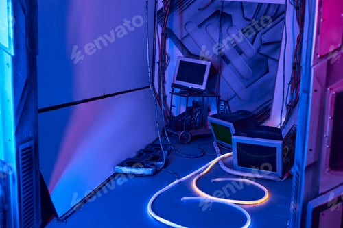 Preview: futuristic concept, computer monitors and wires in neon-lit innovation hub