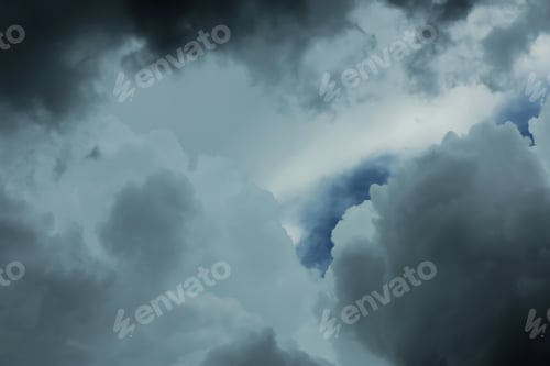 Preview: Sky with heavy rainy clouds on grey day