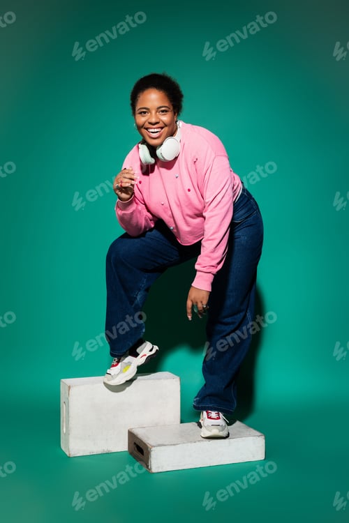 Preview: Plus-size Black woman flaunts trendy autumn outfit in studio
