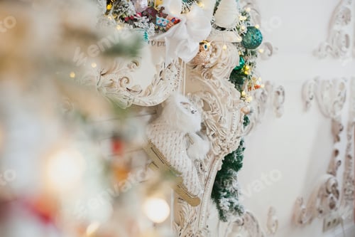 Preview: Vintage fireplace with decorative skates, fir tree garland with Christmas toys