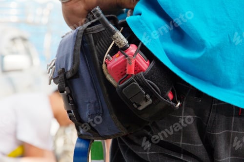 Preview: Close-up of male with Walkie talkie