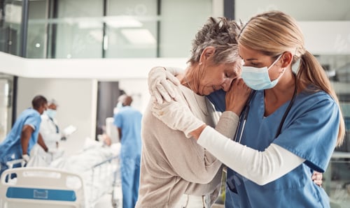 Preview: Doctor, hug and sad senior woman in hospital for support, comfort and empathy for surgery of husban