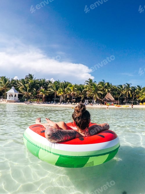 Preview: Girl in inflatable in ocean