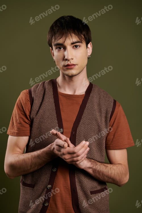 Preview: Elegant Man Posing Against Vibrant Green Background